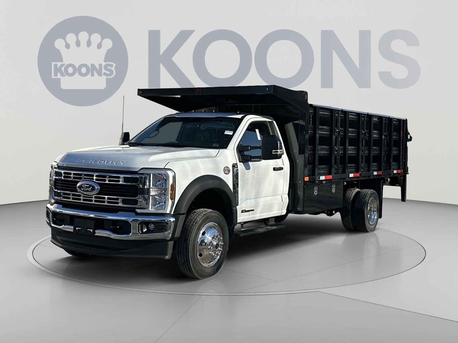 2026 Ford F-550SD XL Stake Body in Oxford White — front three-quarter view