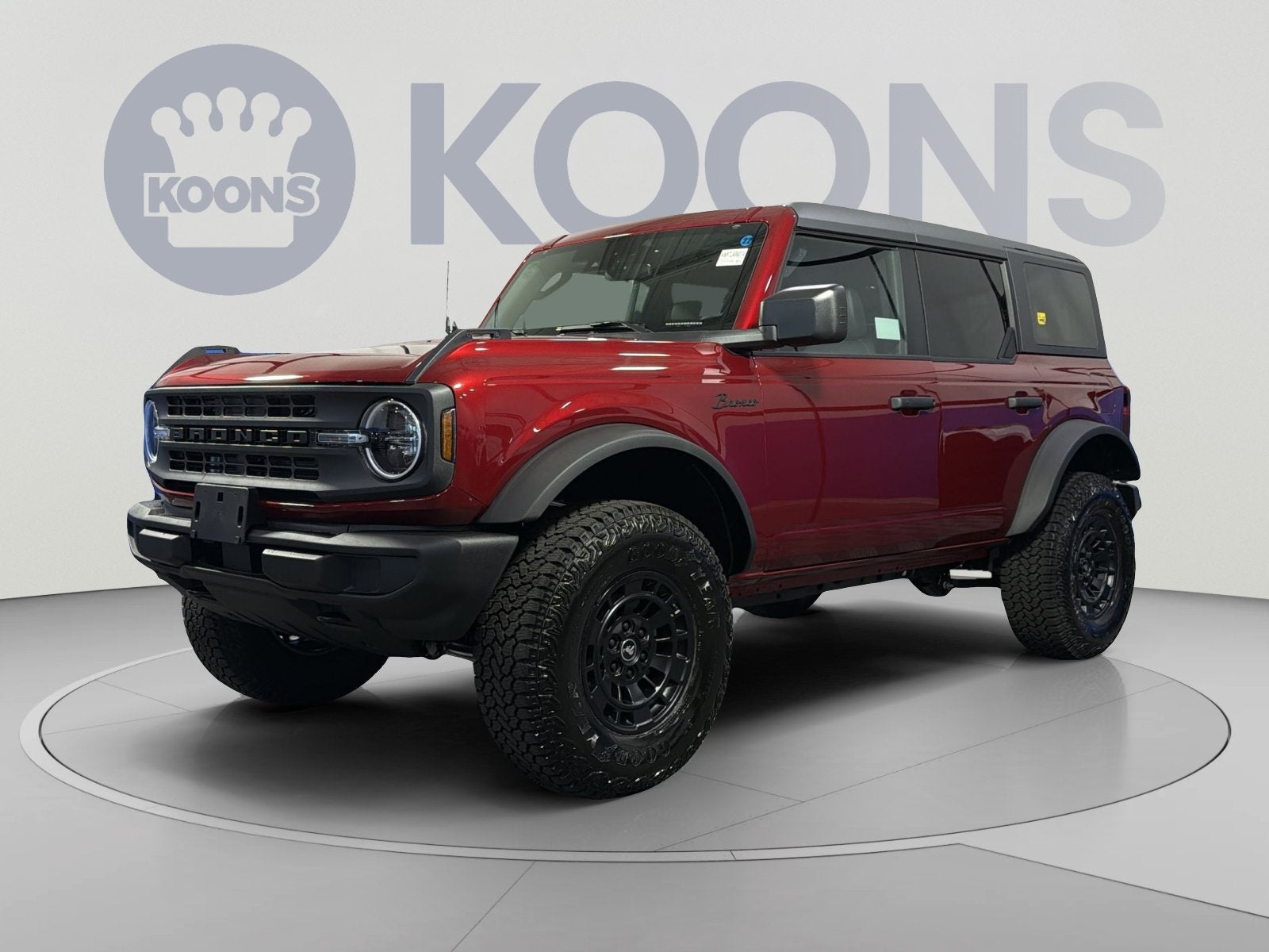 2026 Ford Bronco Big Bend Matte Black Package in Ruby Red Metallic — front three-quarter view