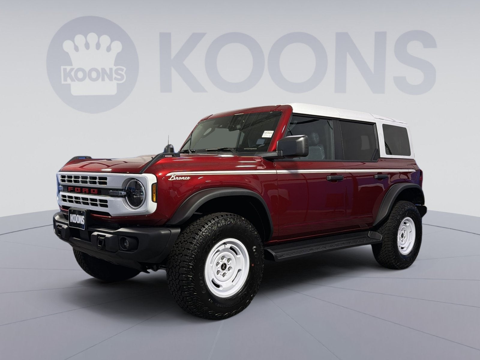 2026 Ford Bronco Heritage Edition in Ruby Red Metallic — front three-quarter view