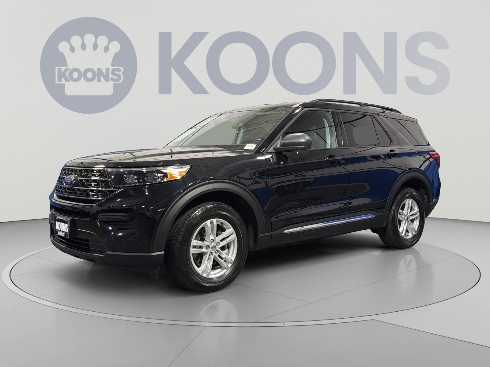 2024 Ford Explorer XLT in Black Metallic — front three-quarter view