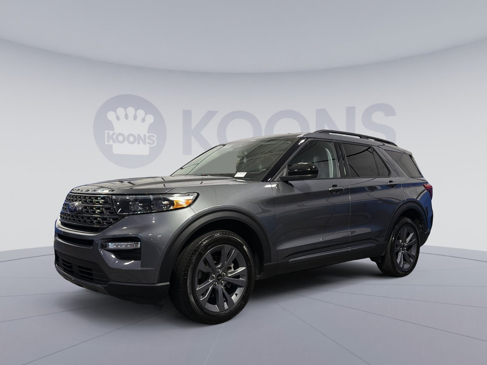 2024 Ford Explorer XLT in Gray Metallic — front three-quarter view