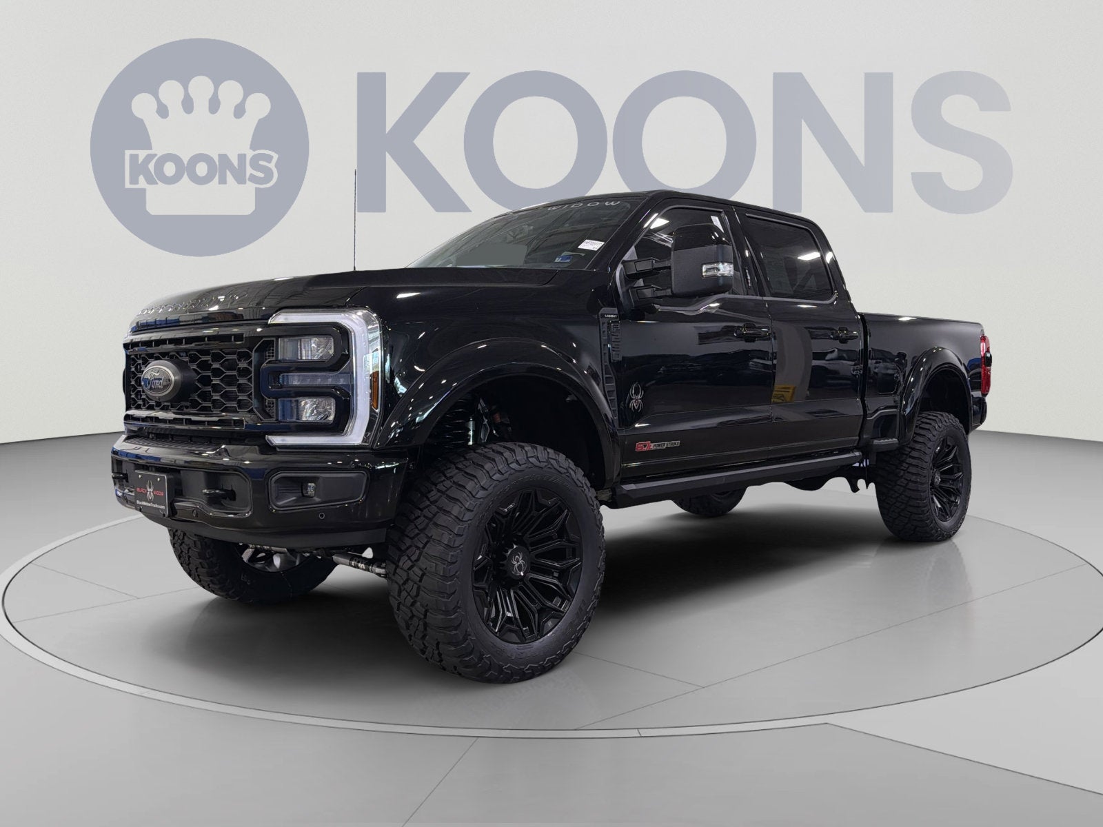 2026 Ford F-250SD Lariat in Black Metallic — front three-quarter view