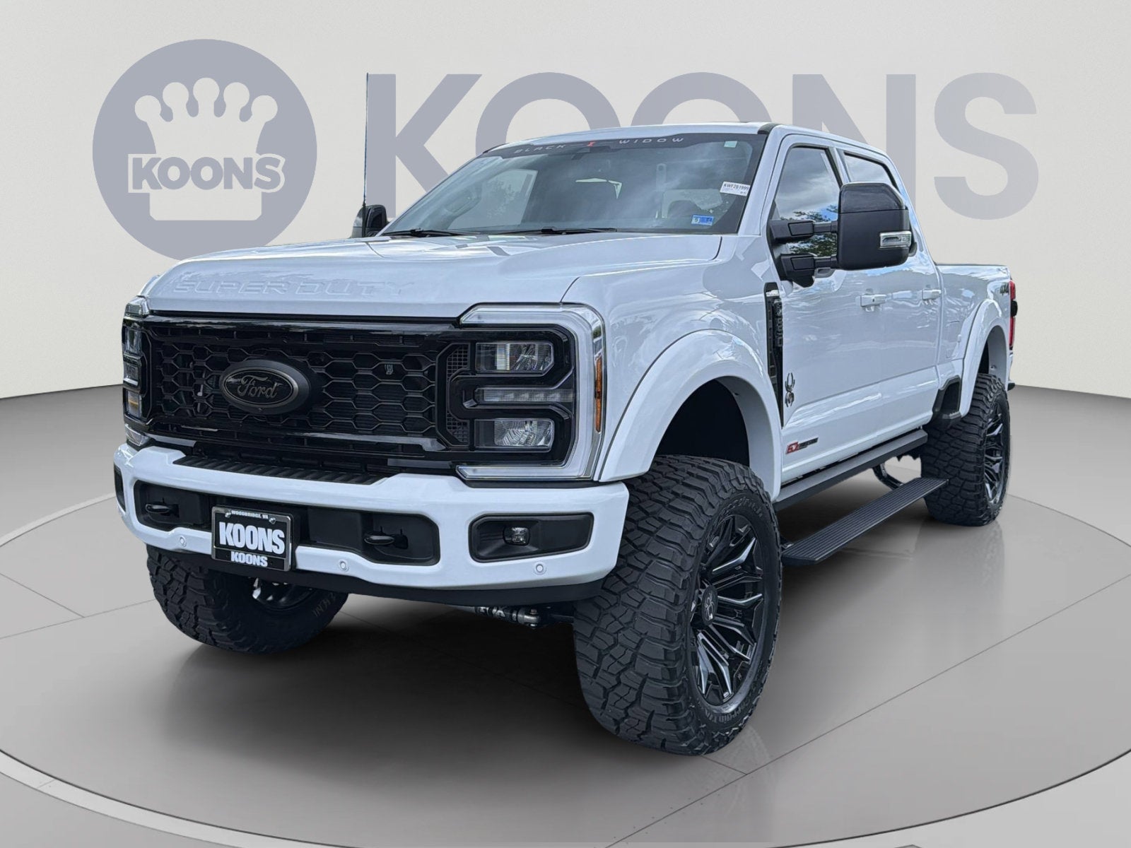 2026 Ford F-250SD Lariat Black Widow in Oxford White — front three-quarter view