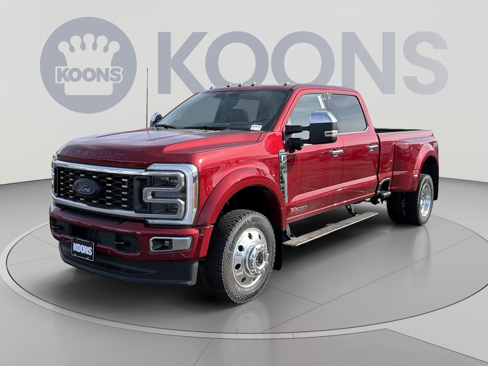2026 Ford F-450SD Platinum in Ruby Red Metallic — front three-quarter view