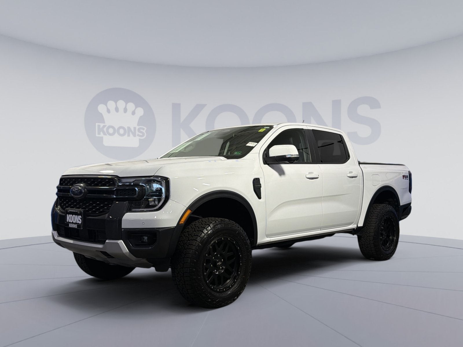 2025 Ford Ranger Lariat in Oxford White — front three-quarter view