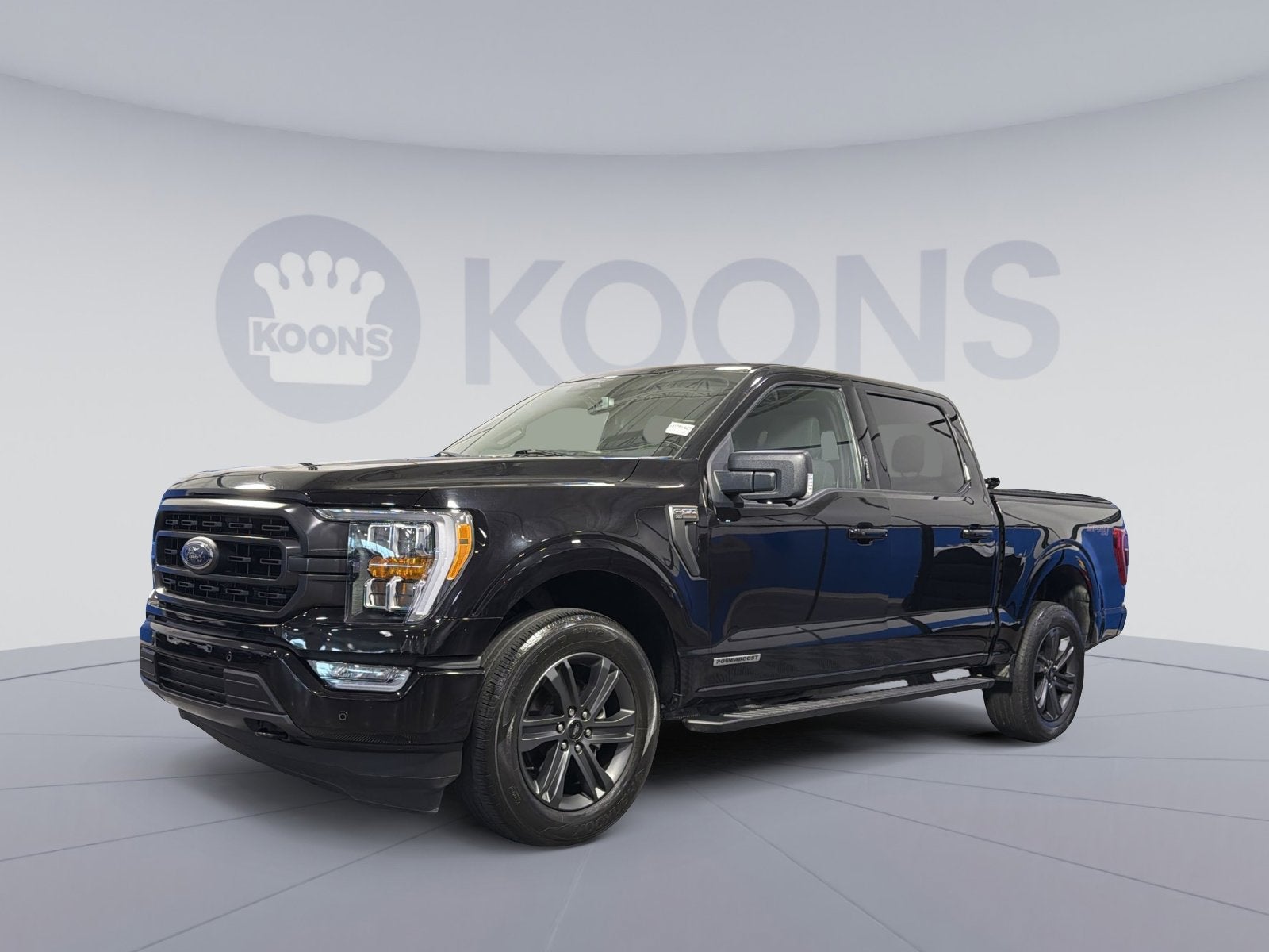 2023 Ford F-150 XLT in Black Metallic — front three-quarter view