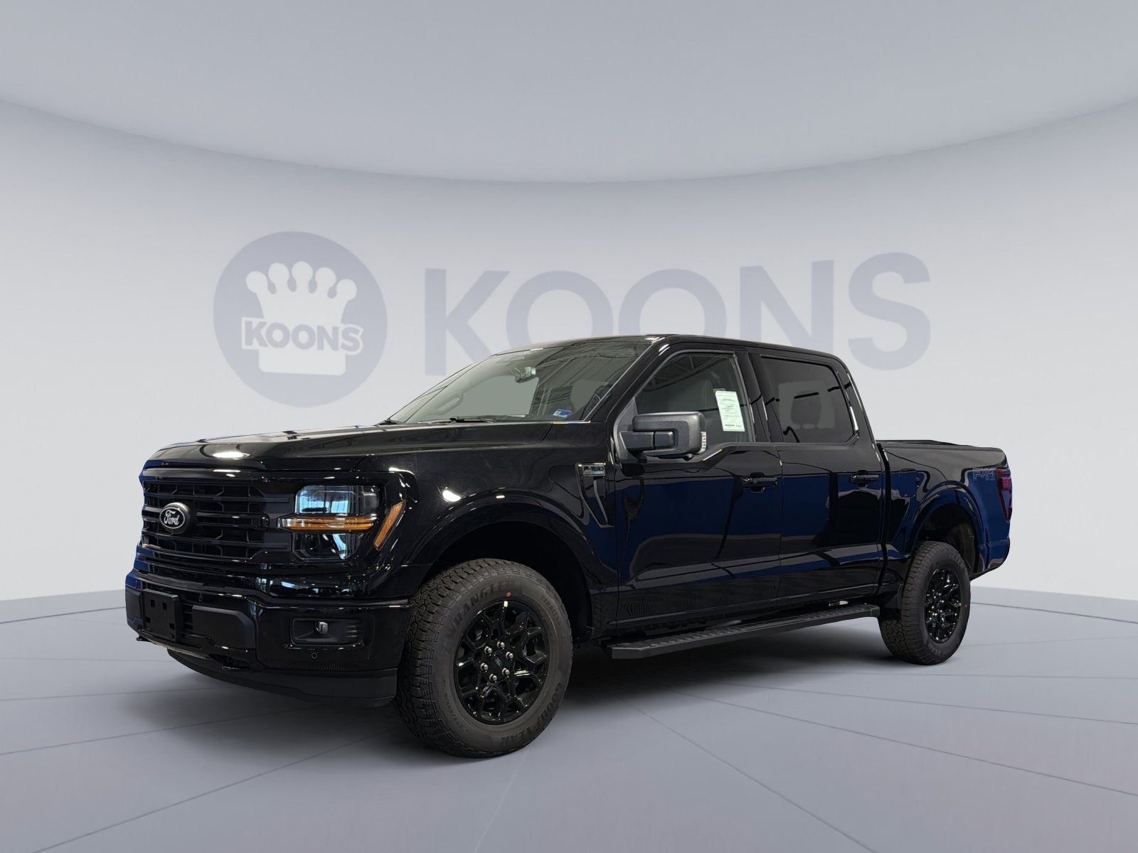 2026 Ford F-150 XLT in Black Metallic — front three-quarter view