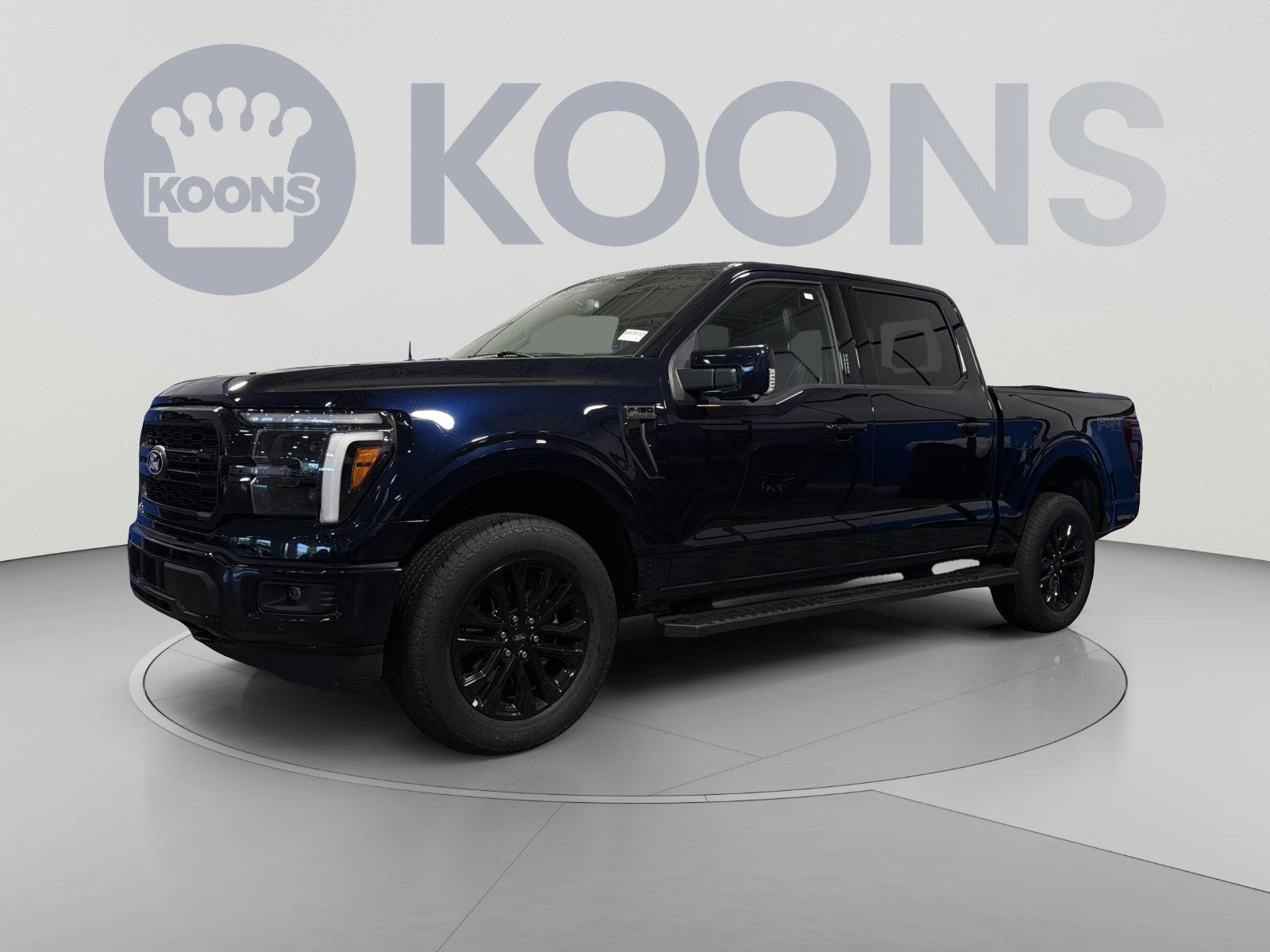 2026 Ford F-150 Lariat in Blue Metallic — front three-quarter view