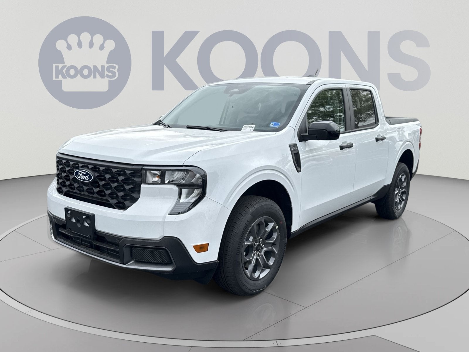 2026 Ford Maverick XLT in Oxford White — front three-quarter view