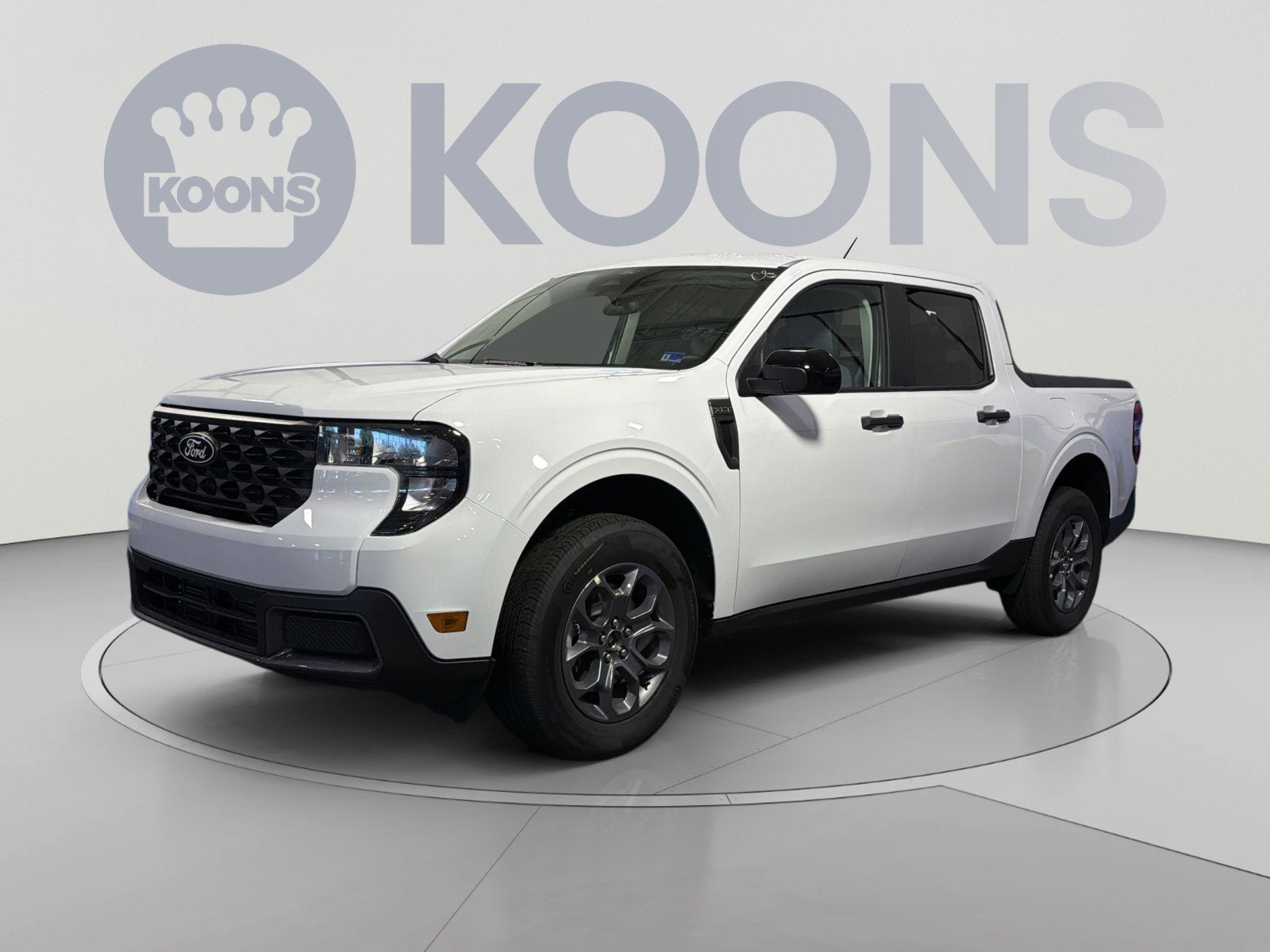 2026 Ford Maverick XLT in Oxford White — front three-quarter view