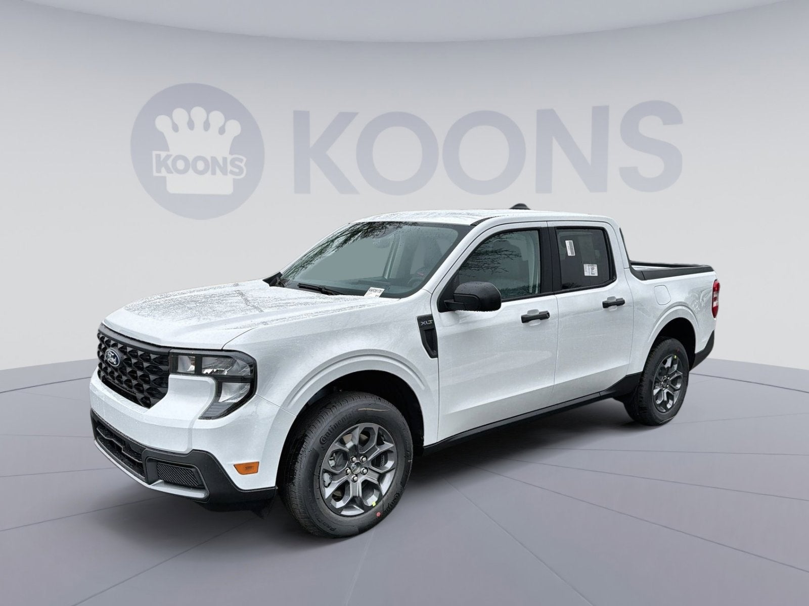 2026 Ford Maverick XLT in Oxford White — front three-quarter view
