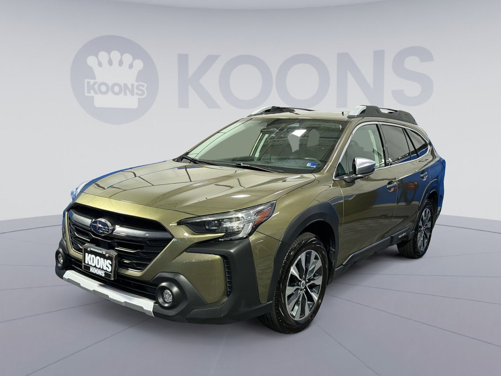 2023 Subaru Outback Touring XT in Autumn Green Metallic — front three-quarter view